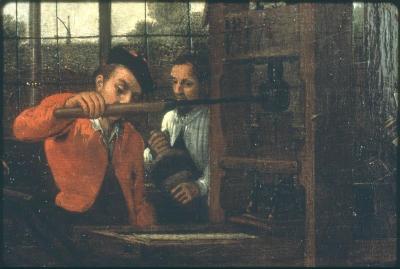 Drukker en inkter in de drukkerij van Jan van de Venne
